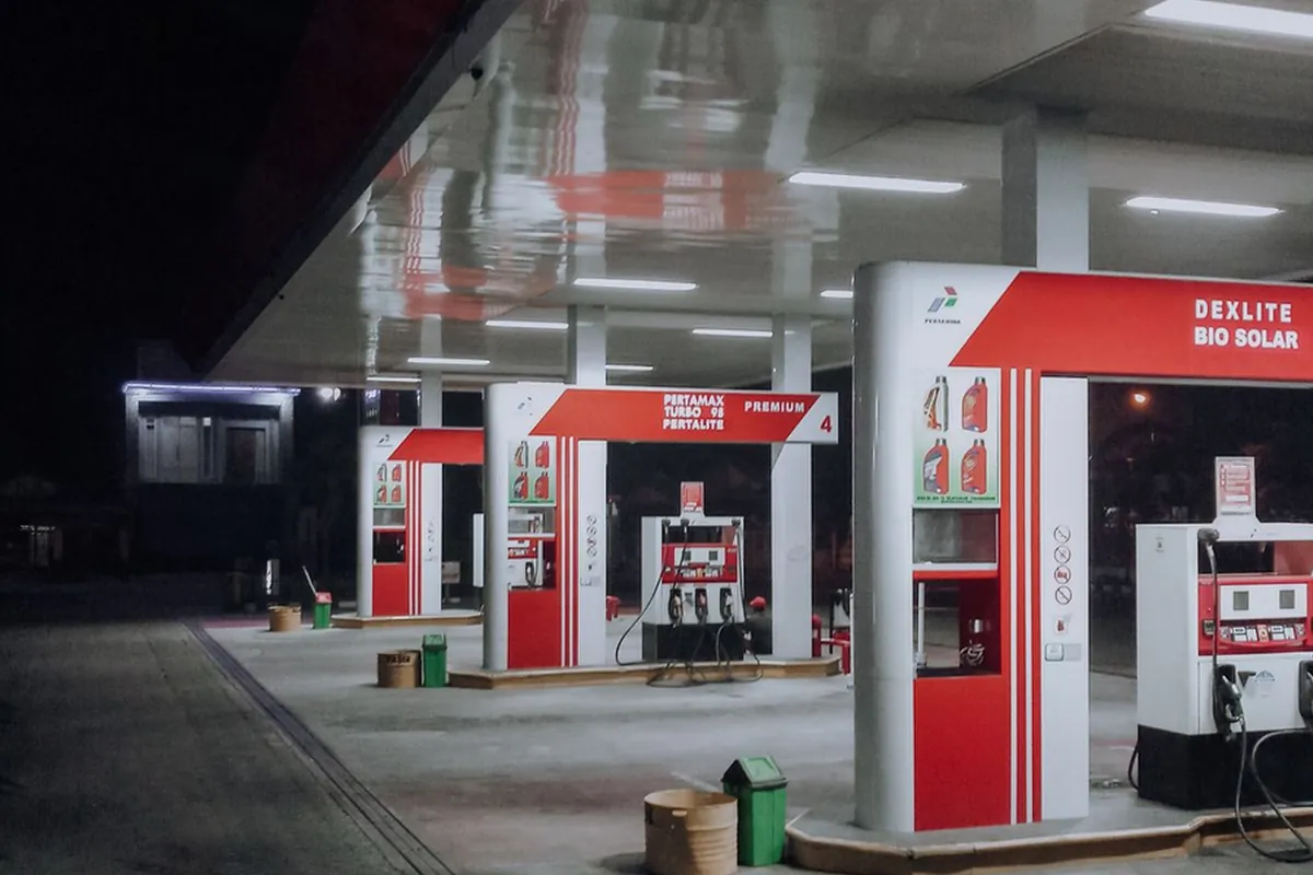 Fuel pump at a UAE petrol station at dusk