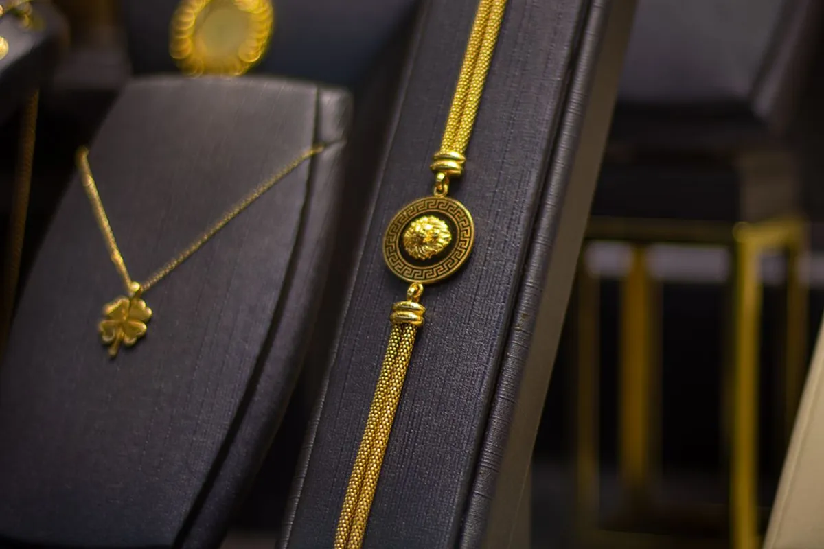 Gold jewelry displayed in a Dubai gold shop window
